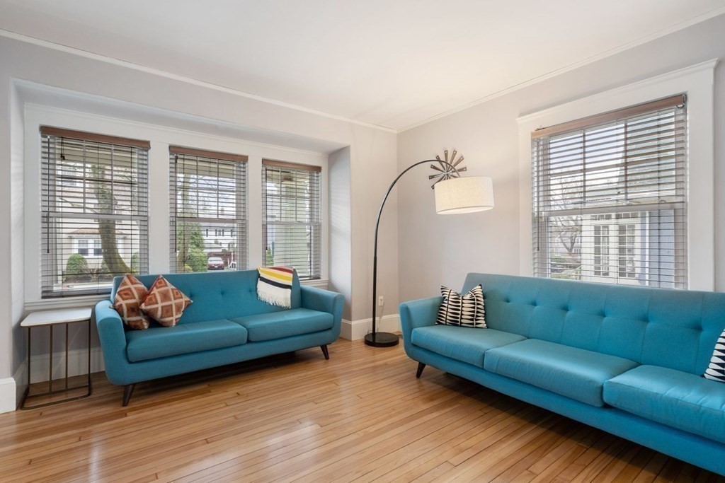 38 Jackson Road Medford, MA 02155 - Photo 7 of 42 a living room with furniture and a large window