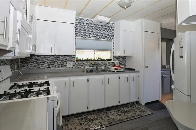 a picture of a bathroom with a bathtub