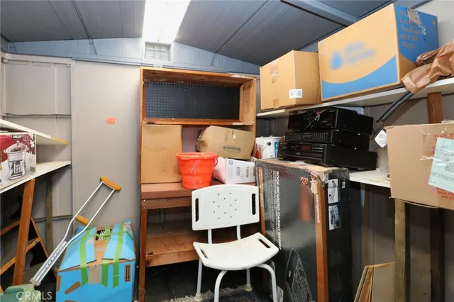 a backyard of a house with outdoor seating