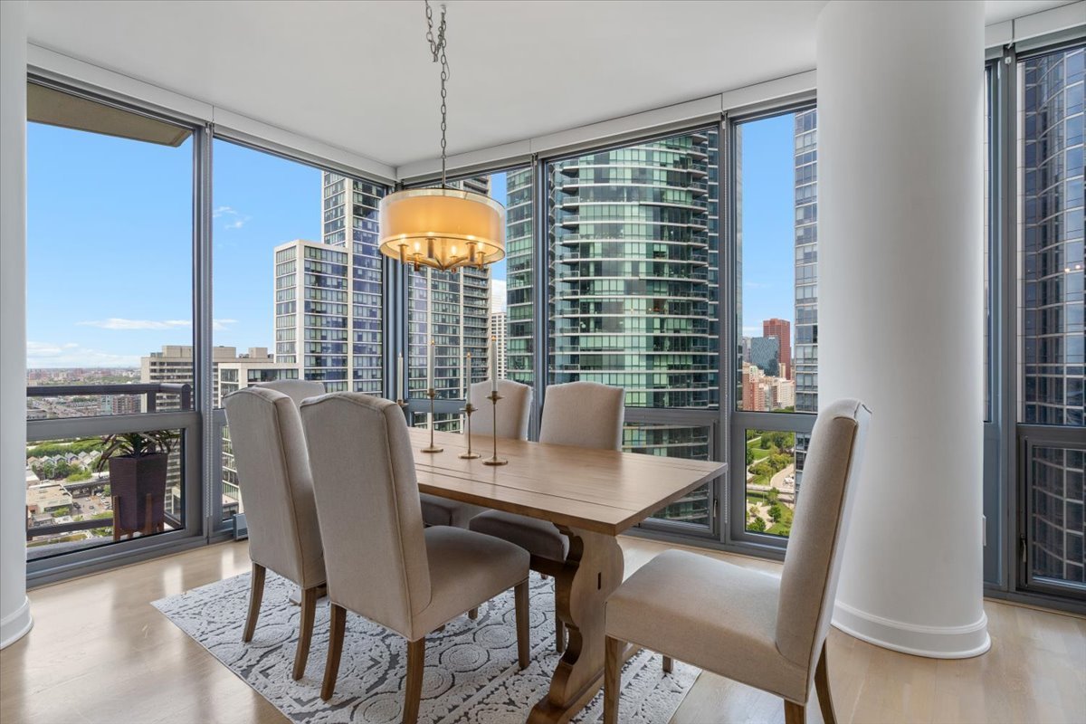 1235 South Prairie Avenue, Unit 2709 Chicago, IL 60605 - Photo 14 of 46 a view of a dining room with furniture window and outside view