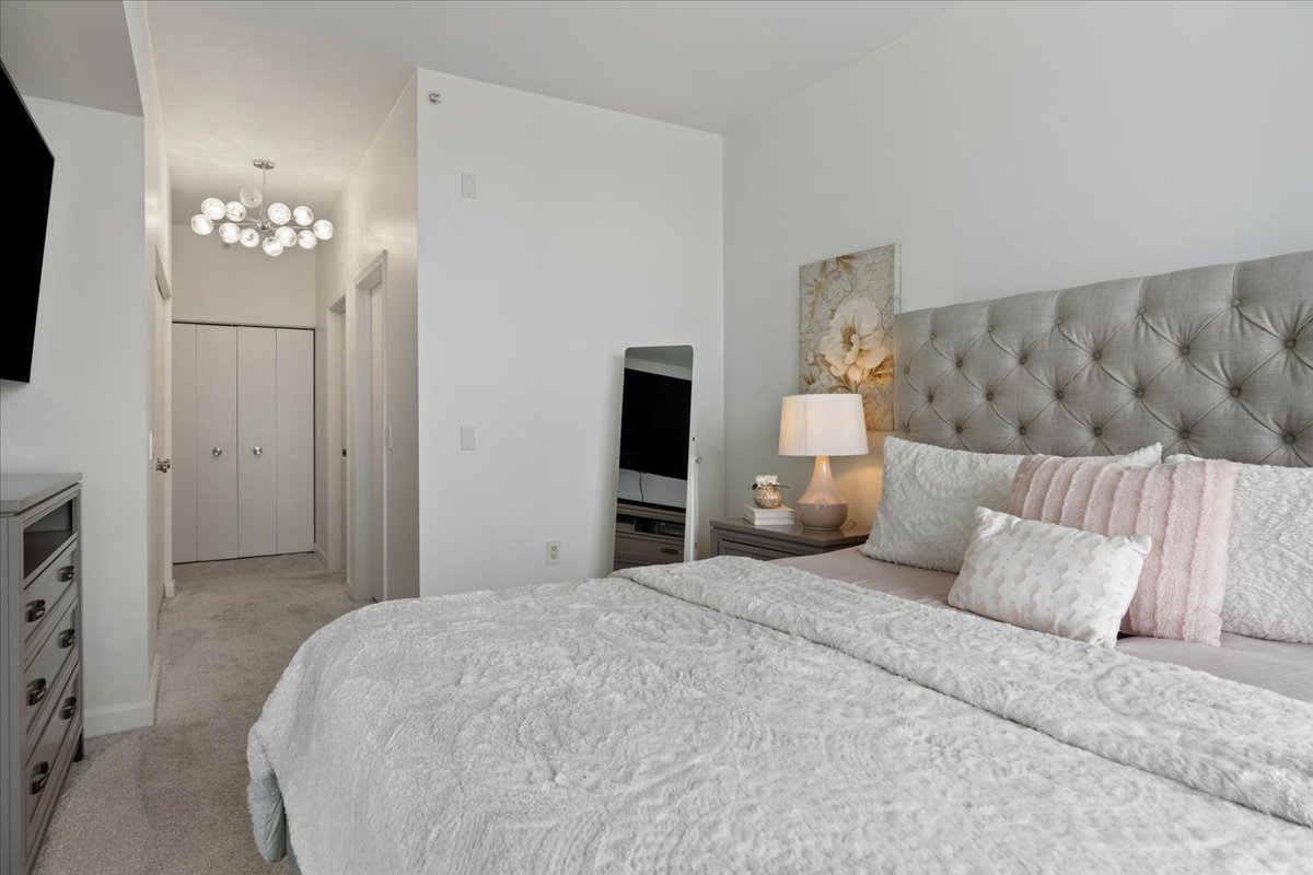 1235 South Prairie Avenue, Unit 2709 Chicago, IL 60605 - Photo 24 of 46 a bedroom with a bed and a television