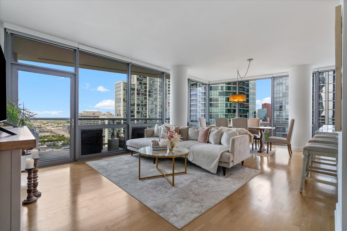 1235 South Prairie Avenue, Unit 2709 Chicago, IL 60605 - Photo 10 of 46 a living room with furniture and a floor to ceiling window or wooden floor