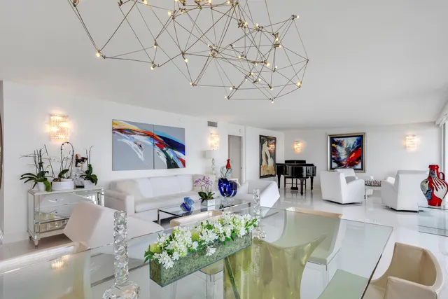 a living room with fireplace furniture and a flat screen tv