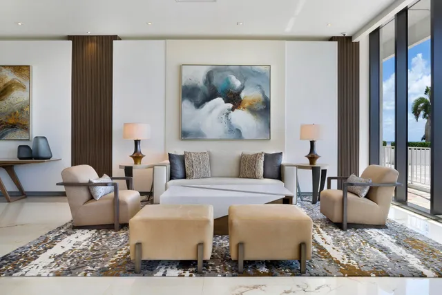 a living room with furniture and a rug