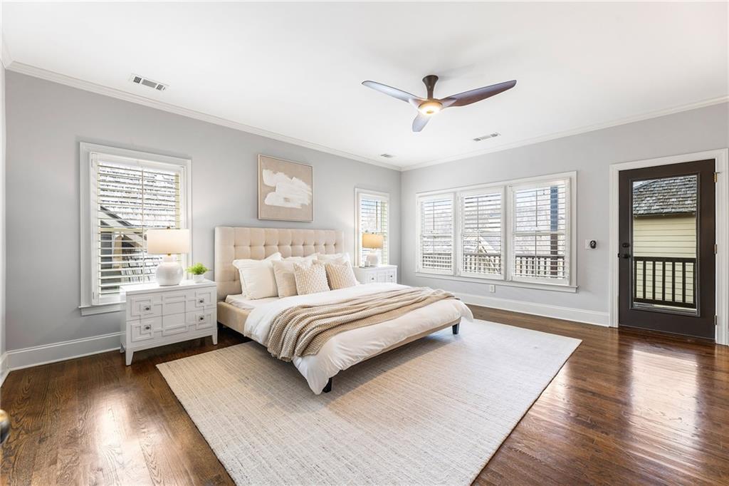 6645 Will Allen Road Cumming, GA 30040 - Photo 28 of 62 a spacious bedroom with a large bed and a large window