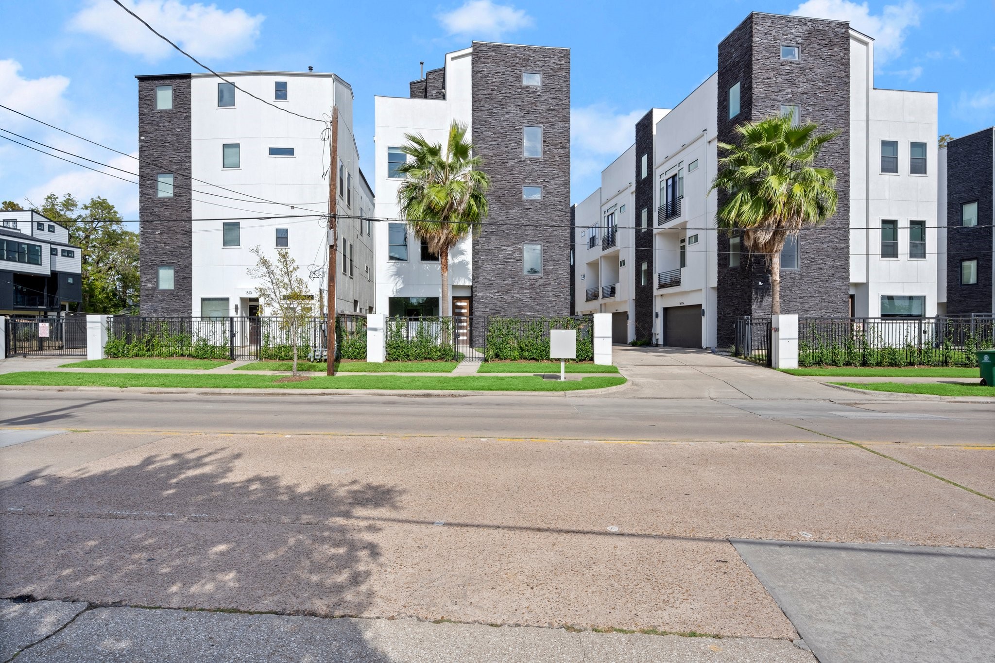 a view of a building with a yard