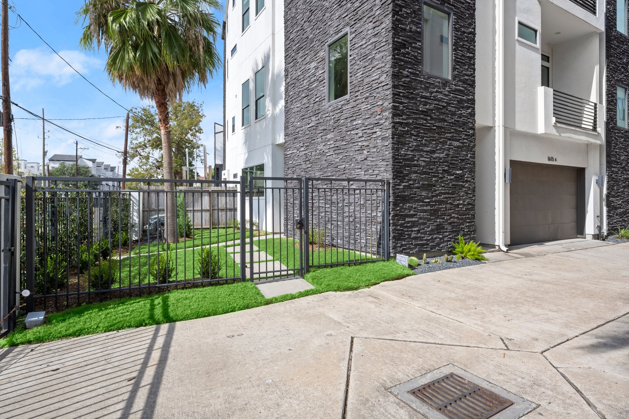 1615 Wheeler Avenue, Unit A Houston, TX 77004 - Photo 28 of 28 a view of a garden with a small yard and plants