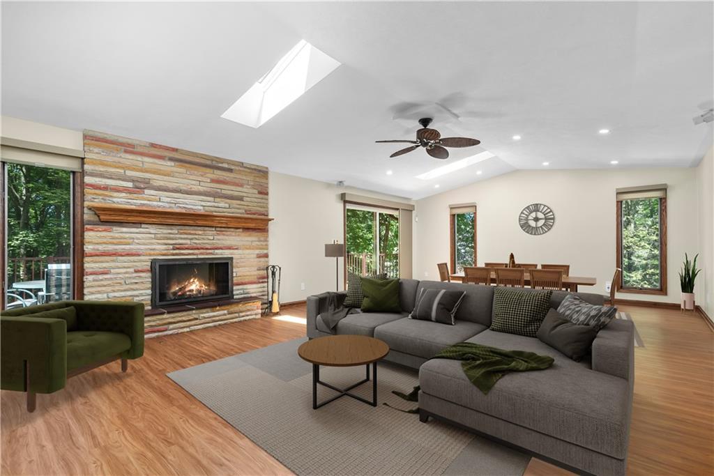 7005 Franklin Road Cranberry Township, PA 16066 - Photo 12 of 26 a living room with furniture and a fireplace
