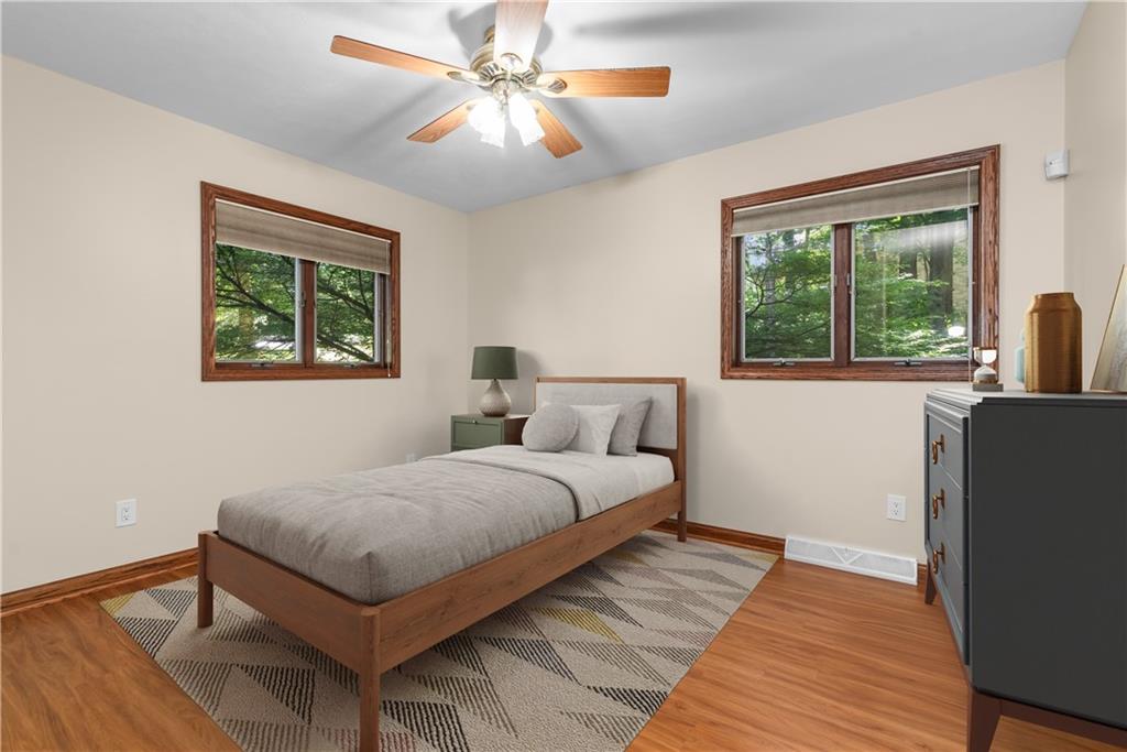 7005 Franklin Road Cranberry Township, PA 16066 - Photo 20 of 26 a bedroom with a large bed and a window
