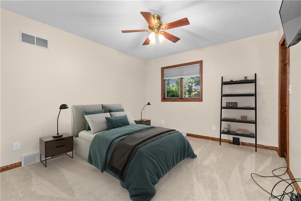 7005 Franklin Road Cranberry Township, PA 16066 - Photo 21 of 26 a bedroom with a bed and a chandelier