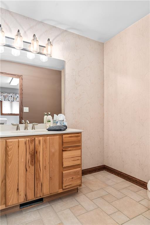 7005 Franklin Road Cranberry Township, PA 16066 - Photo 23 of 26 a bathroom with a sink and a mirror