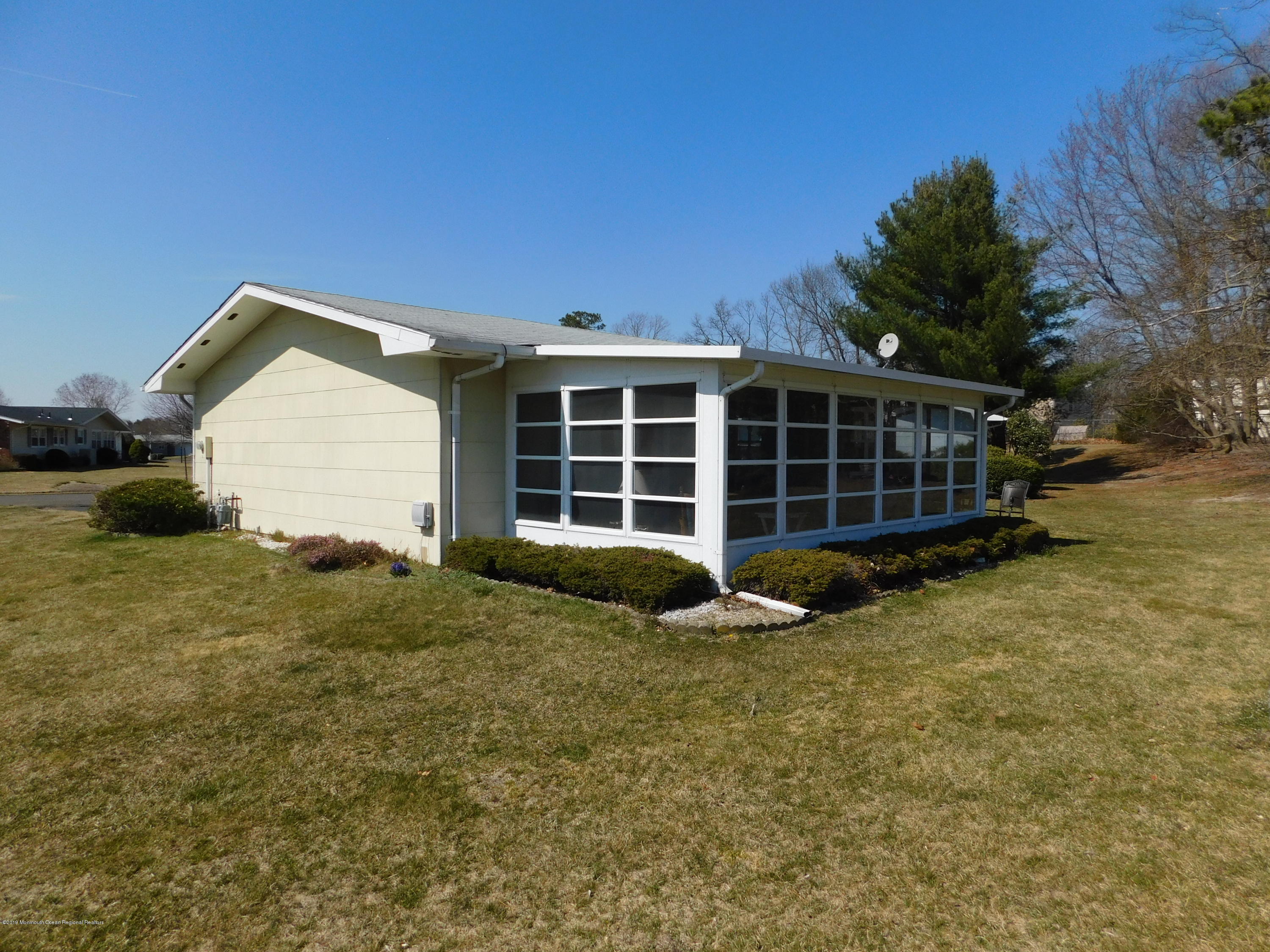 26 Masters Road Brick, NJ 08724 - Photo 13 of 14 a view of a house with a yard
