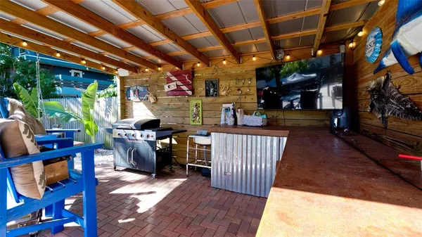 a view of a porch with furniture