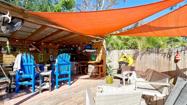 a view of sitting area with furniture and backyard