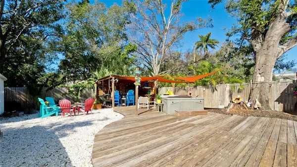a view of a chairs and tables in the patio