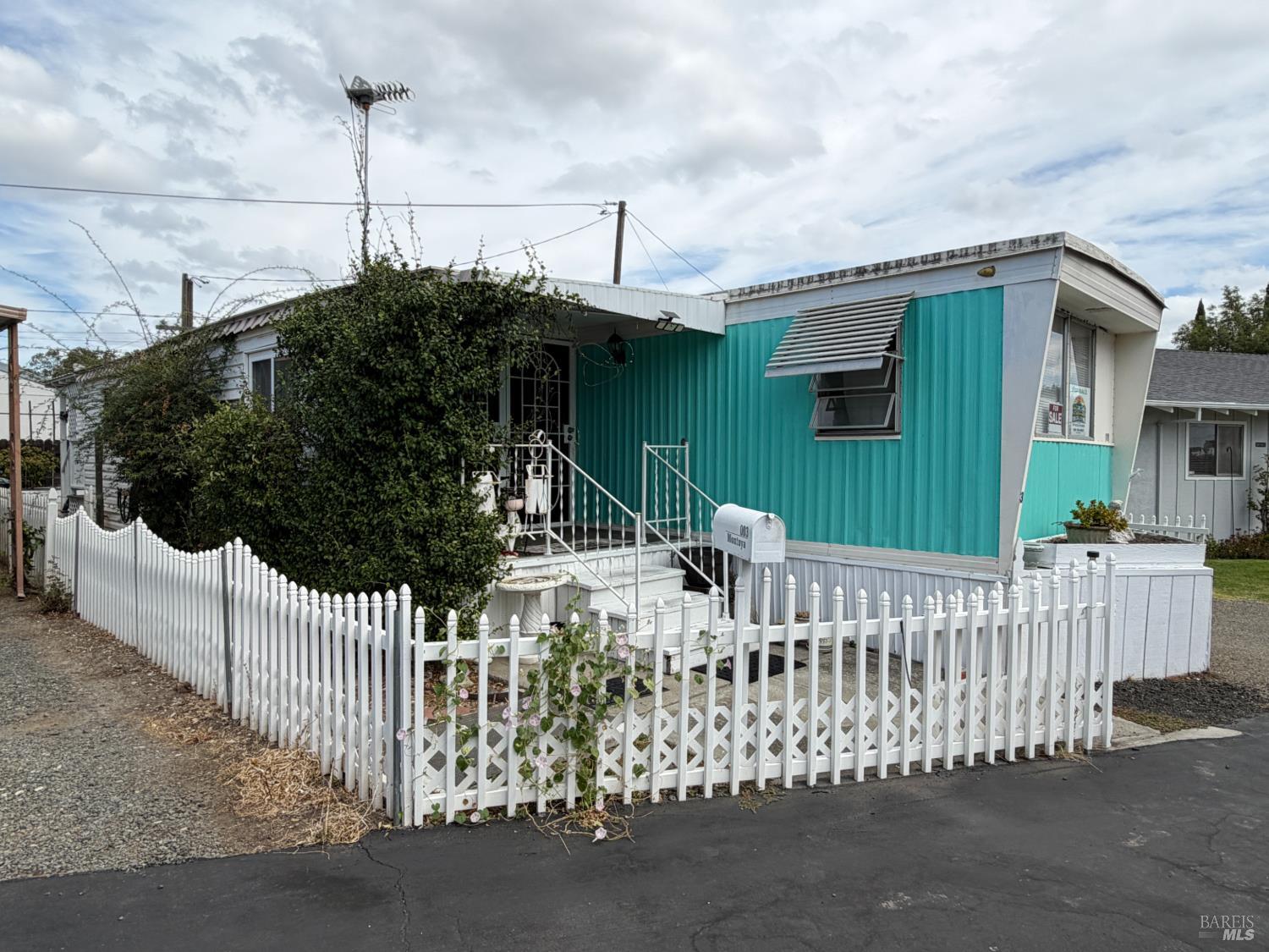 50 River Road, Unit 3 Isleton, CA 94571 - Photo 1 of 25 White picket fence and a colorful exterior make this great place to call home.