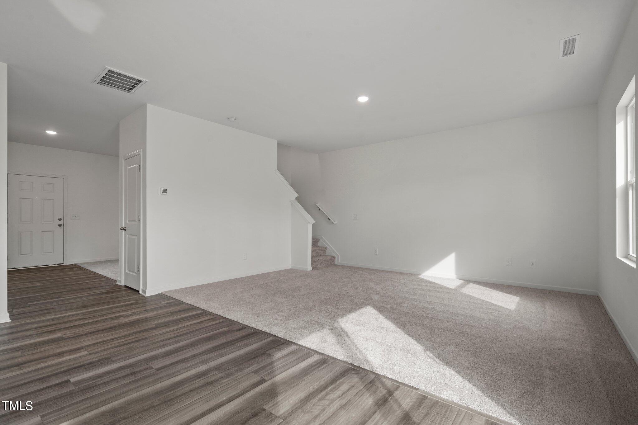 800 Piaggio Lane Spring Hope, NC 27882 - Photo 24 of 33 a view of empty room with wooden floor