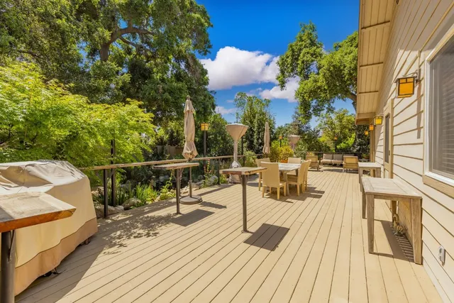 a view of a balcony with chairs