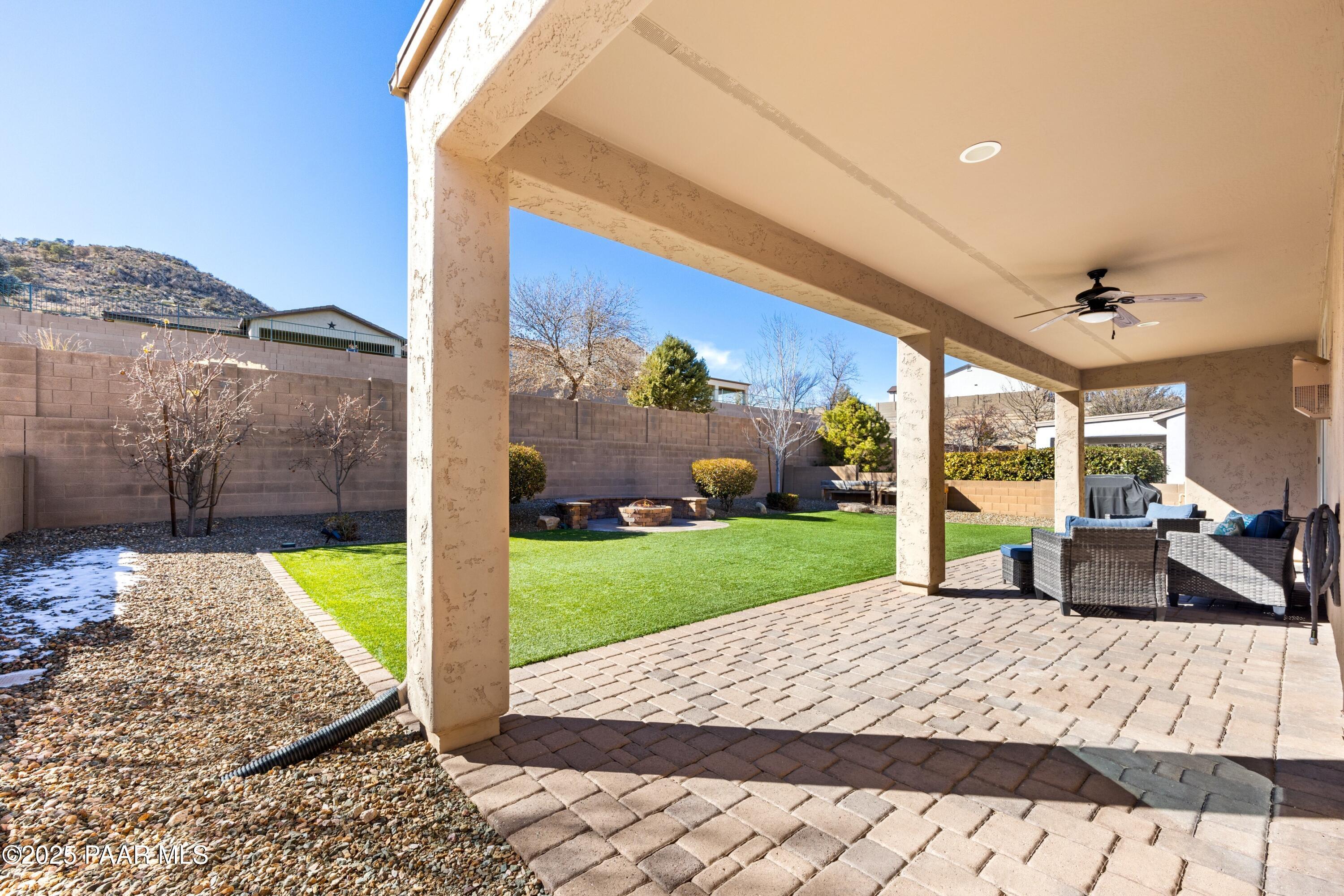 1200 Rusty Nail Road Prescott Valley, AZ 86314 - Photo 18 of 32 a view of a porch with furniture and garden