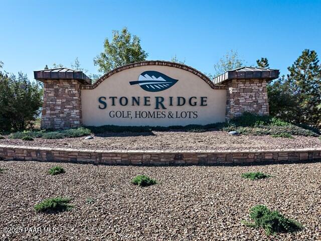 1200 Rusty Nail Road Prescott Valley, AZ 86314 - Photo 24 of 32 a view of outdoor space with signage and flags