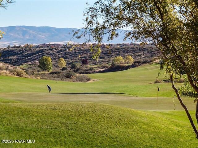 1200 Rusty Nail Road Prescott Valley, AZ 86314 - Photo 25 of 32 a view of a lake with a big yard