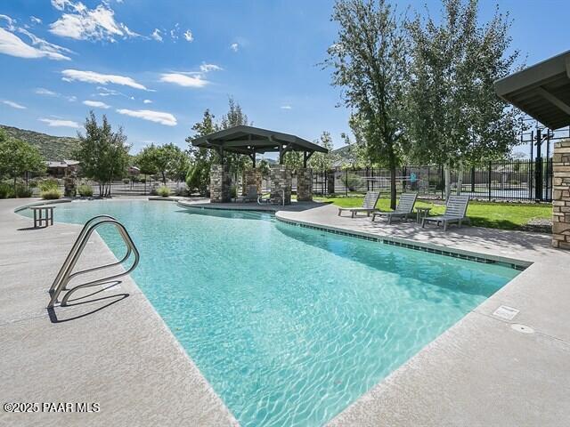 1200 Rusty Nail Road Prescott Valley, AZ 86314 - Photo 27 of 32 a view of a garden with a slide