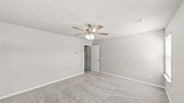 a view of a chandelier fan in a room