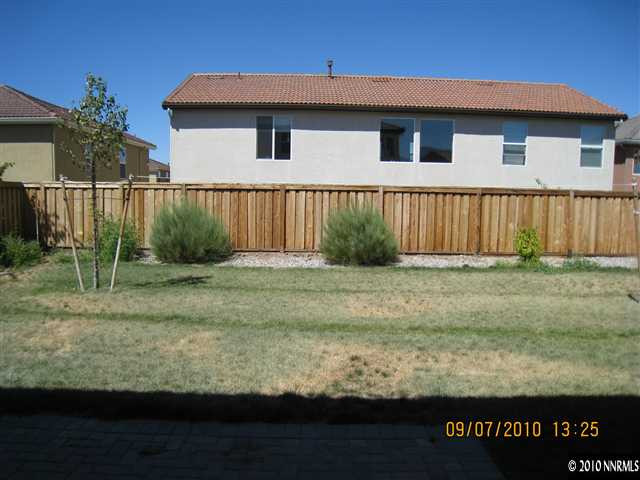425 Cortono Drive Reno, NV 89521 - Photo 8 of 9 a house that has a lot of plants in it