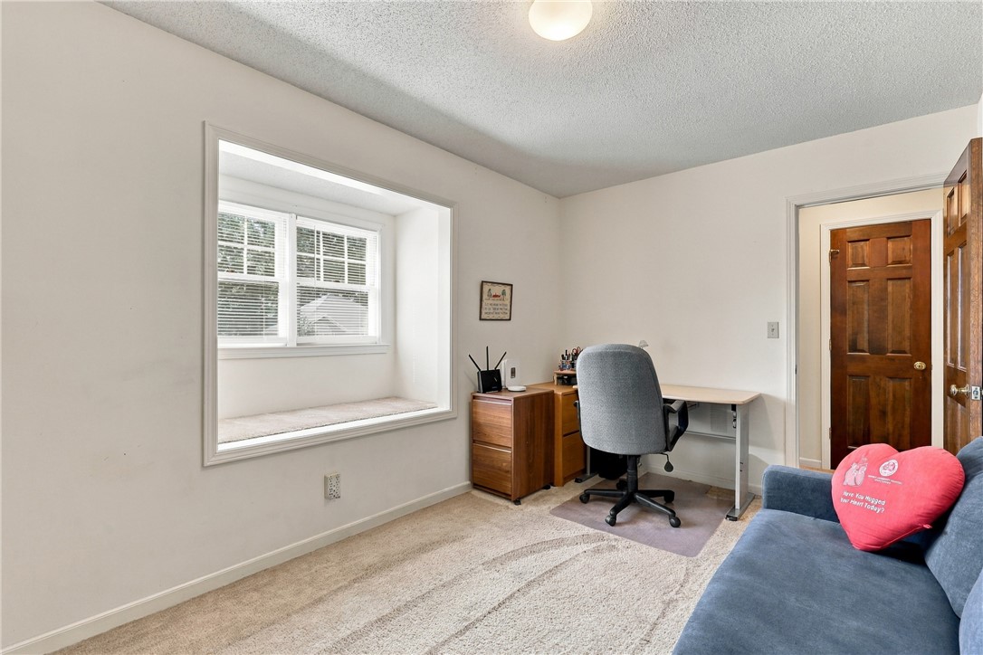 7 Woodbridge Circle Anderson, SC 29621 - Photo 20 of 26 A deep bay window bench anchors this versatile office space with soft wall-to-wall carpeting.