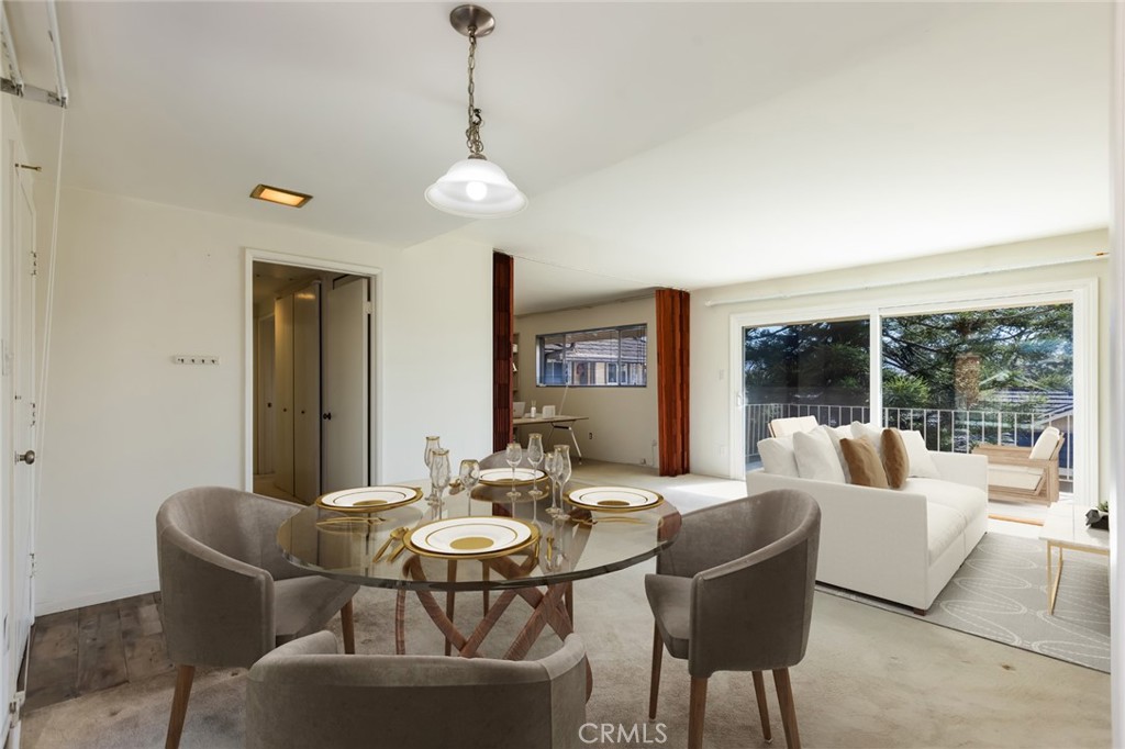 23026 Nadine Circle, Unit B Torrance, CA 90505 - Photo 11 of 56 a view of a dining room with furniture window and outside view