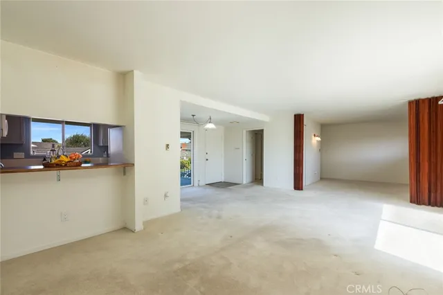 a kitchen with a sink a stove and cabinets