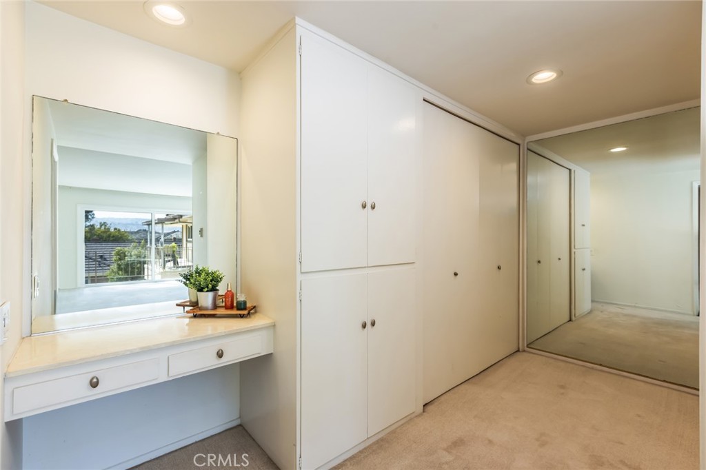 23026 Nadine Circle, Unit B Torrance, CA 90505 - Photo 28 of 56 vanity and dressing area in primary bedroom