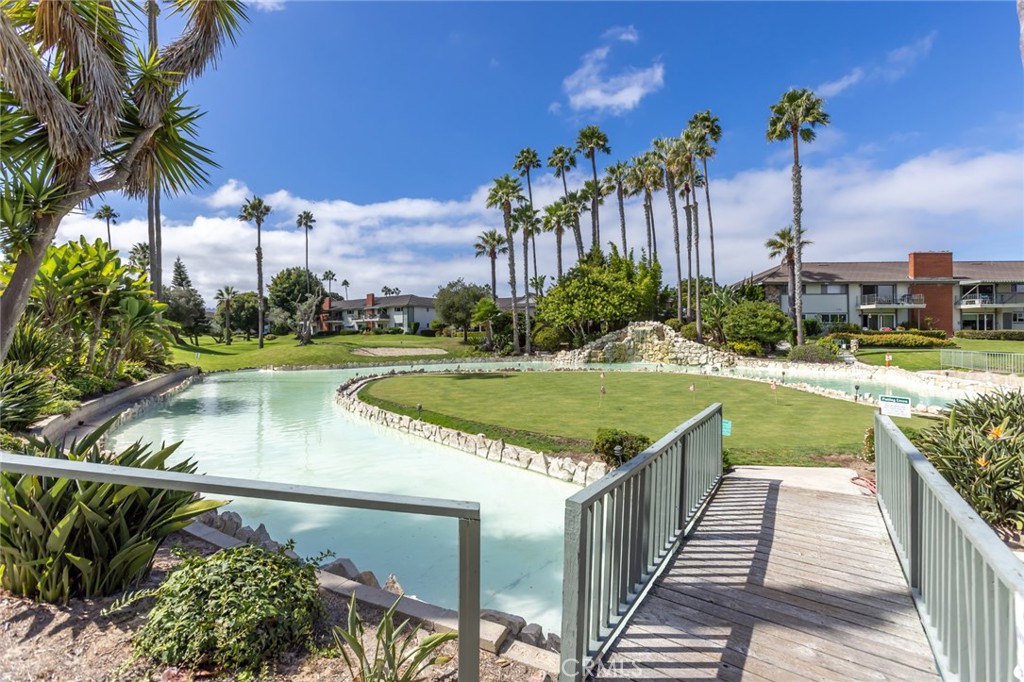 23026 Nadine Circle, Unit B Torrance, CA 90505 - Photo 42 of 56 a view of a swimming pool and a terrace