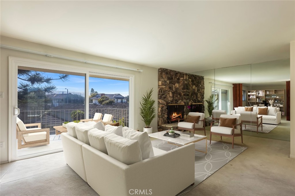 23026 Nadine Circle, Unit B Torrance, CA 90505 - Photo 7 of 56 a living room with furniture and a large window