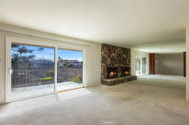 a view of a balcony with wooden floor