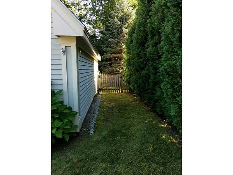 7 Baxter Lane Brunswick, ME 04011 - Photo 28 of 35 Exterior Front. Mature trees create...