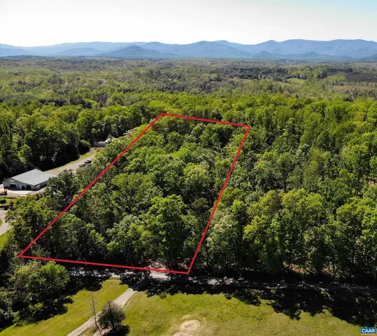 a view of a mountain with a lake