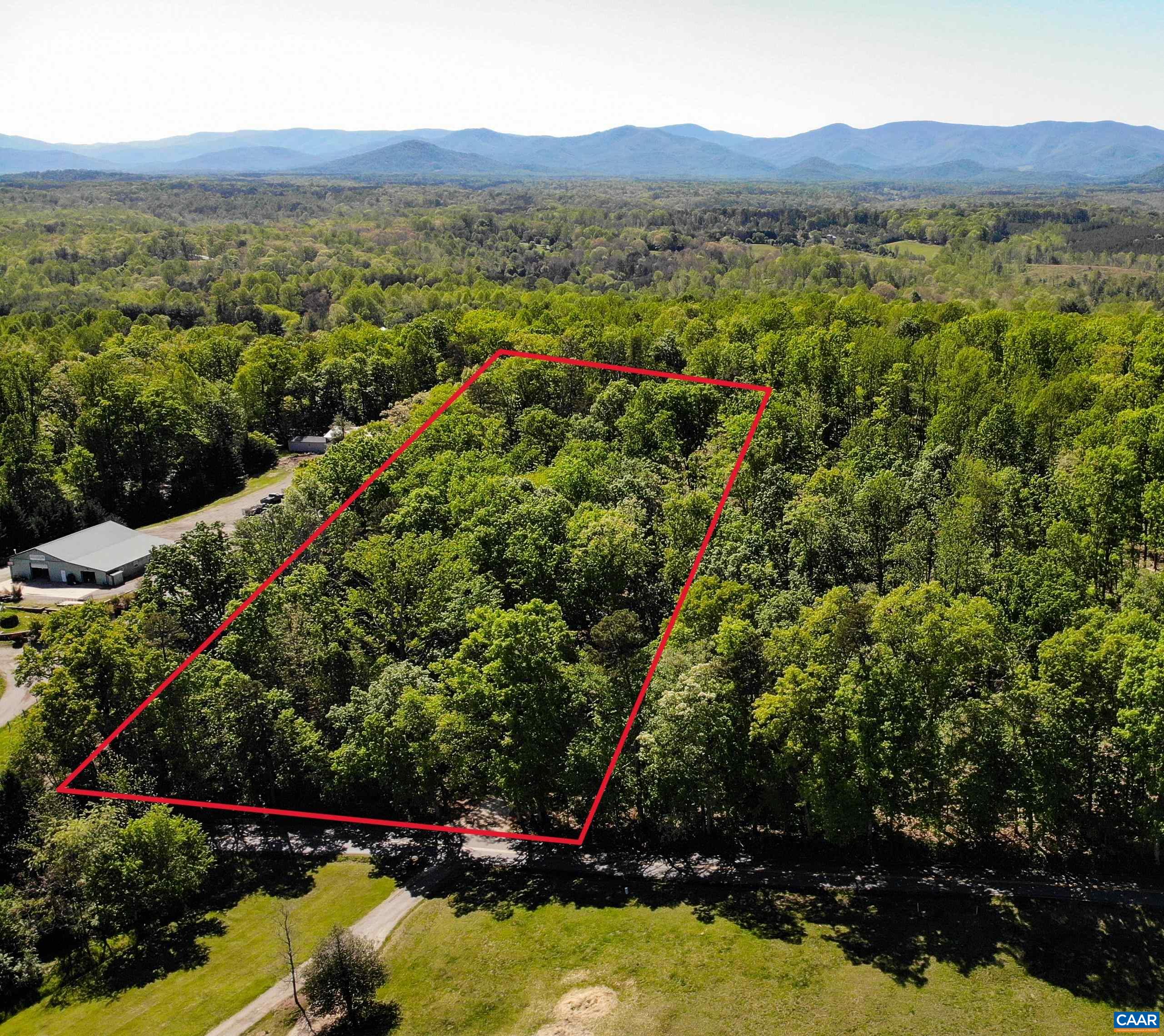 a view of a mountain with a lake