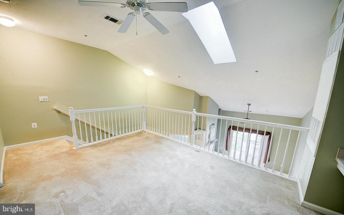 9480 Virginia Center Boulevard, Unit 420 Vienna, VA 22181 - Photo 5 of 17 a view of a hallway with stairs