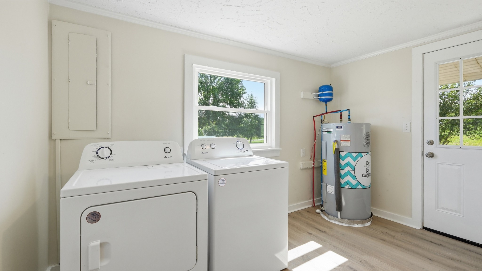 469 Fred Cooper Road McMinnville, TN 37110 - Photo 32 of 46 a view of storage and utility room with washer and dryer