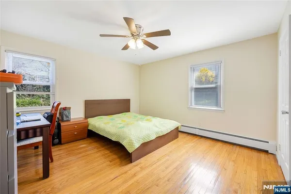 a bedroom with a bed and a table