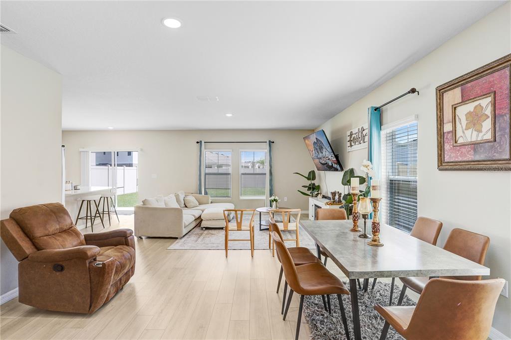 7704 Twinleaf Ter Way Parrish, FL 34219 - Photo 15 of 31 a living room with furniture and wooden floor