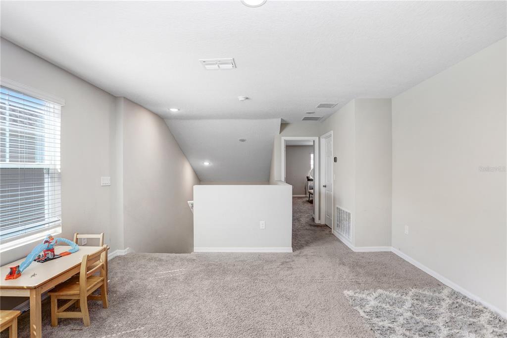 7704 Twinleaf Ter Way Parrish, FL 34219 - Photo 19 of 31 a view of work space with furniture and windows