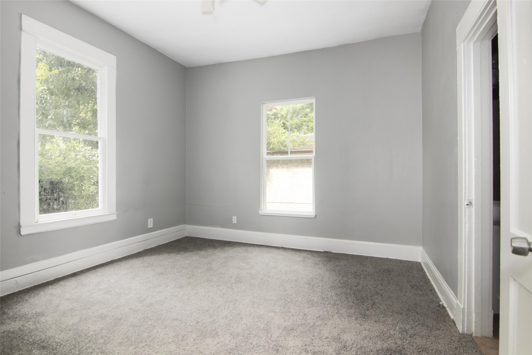 3220 Melbourne Street Houston, TX 77026 - Photo 12 of 23 an empty room with a window