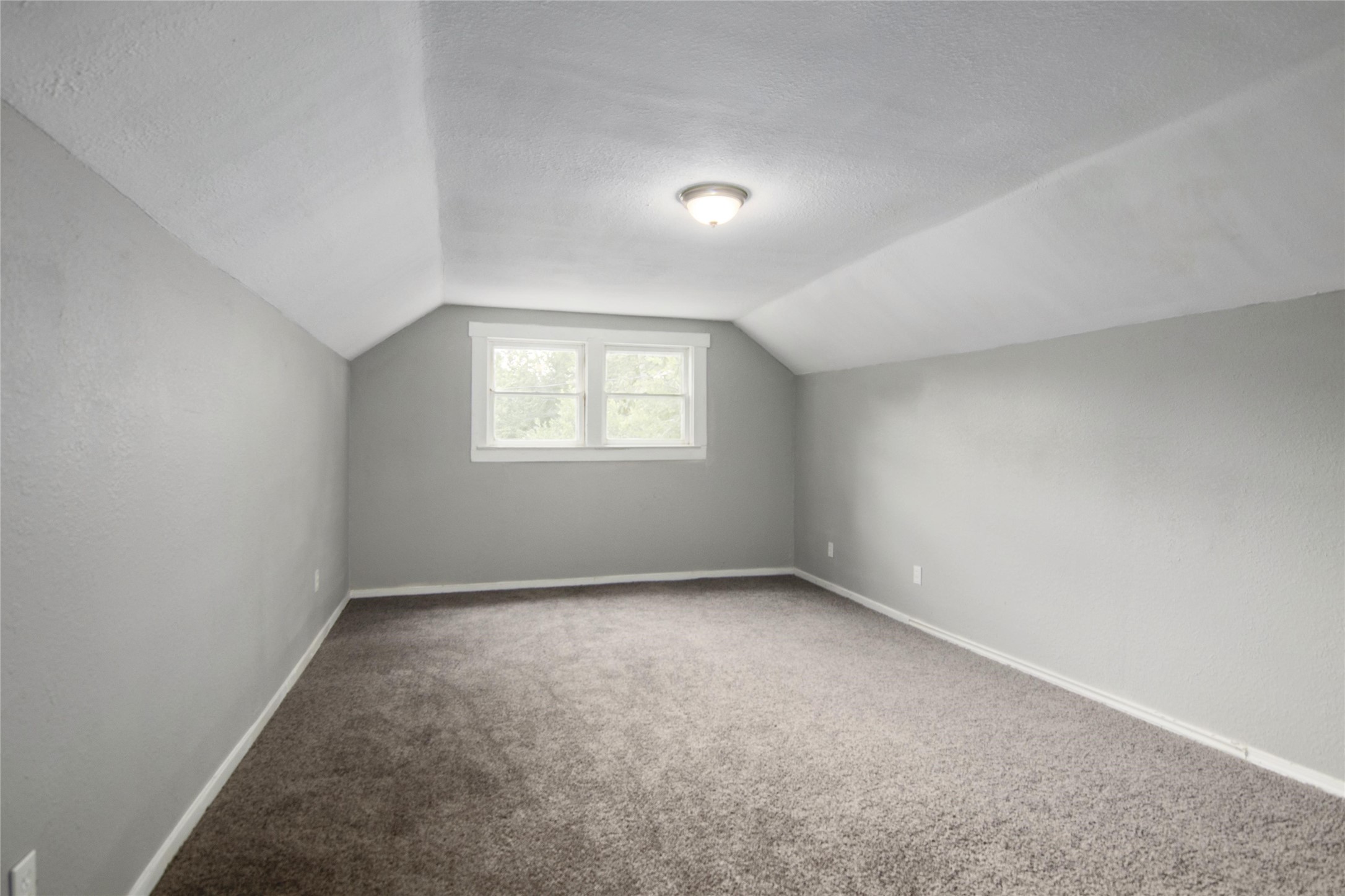3220 Melbourne Street Houston, TX 77026 - Photo 18 of 23 an empty room with a window