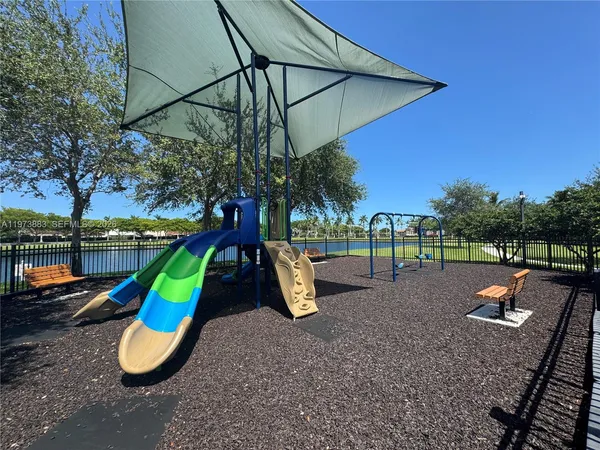 a view of a park with slide