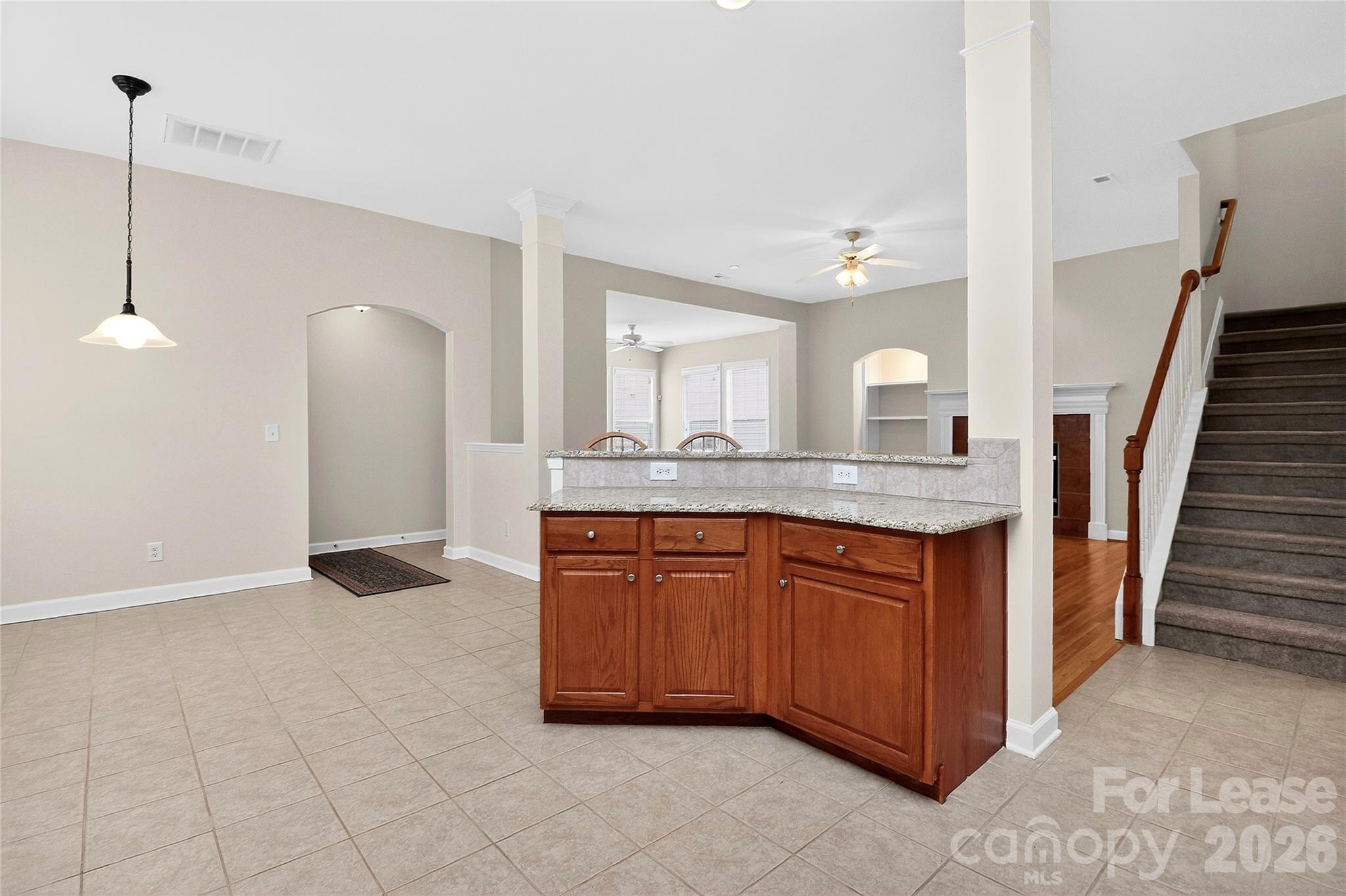 9315 Rosalyn Glen Road Cornelius, NC 28031 - Photo 14 of 35 a spacious bathroom with a granite countertop sink a mirror and a shower