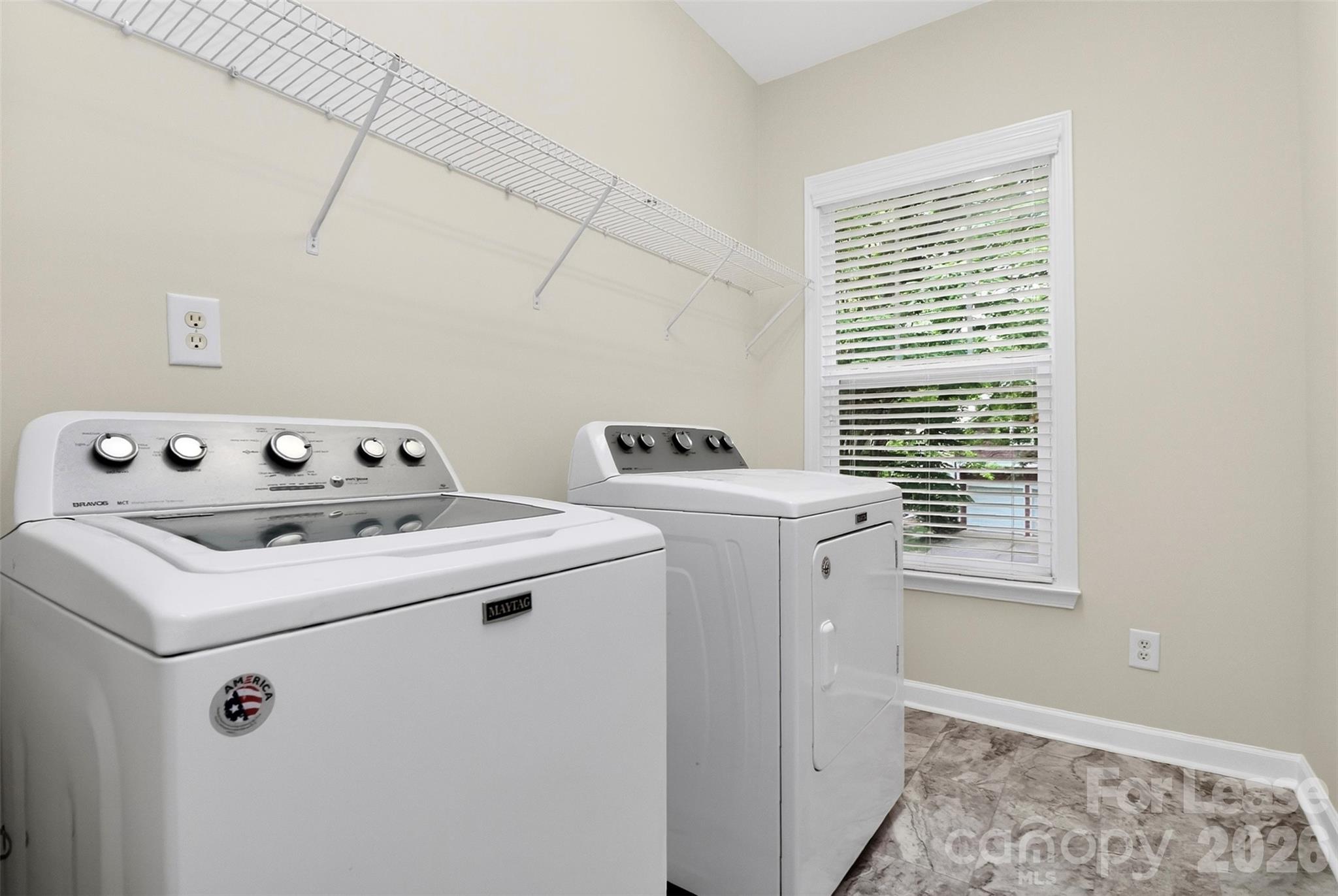9315 Rosalyn Glen Road Cornelius, NC 28031 - Photo 27 of 35 a utility room with dryer and washer