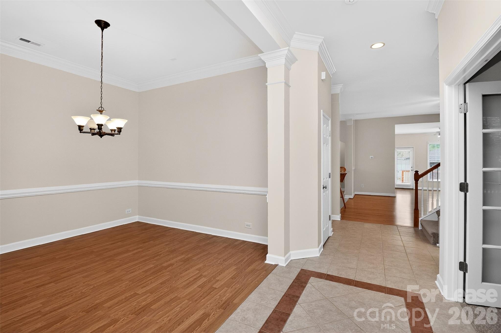 9315 Rosalyn Glen Road Cornelius, NC 28031 - Photo 5 of 35 a view of empty room with wooden floor
