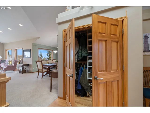 a view of a bedroom with furniture and windows